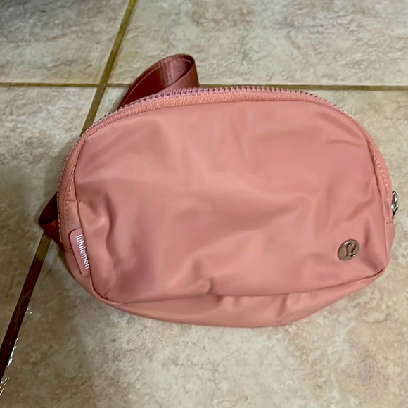lululemon athletica Handbags - Lululemon Everywhere Belt Bag in a pale pink!